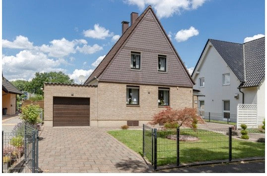 Charmantes Einfamilienhaus mit Gartenoase in ruhiger Lage.