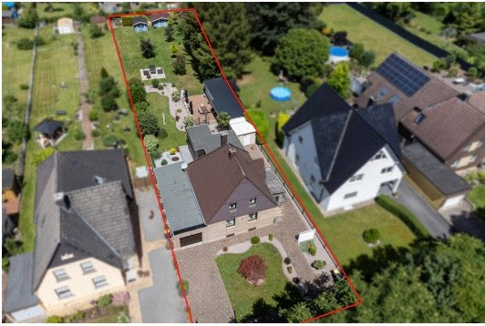 Charmantes Einfamilienhaus mit Gartenoase in ruhiger Lage.