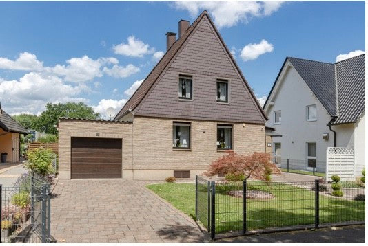 Charmantes Einfamilienhaus mit Gartenoase in ruhiger Lage.